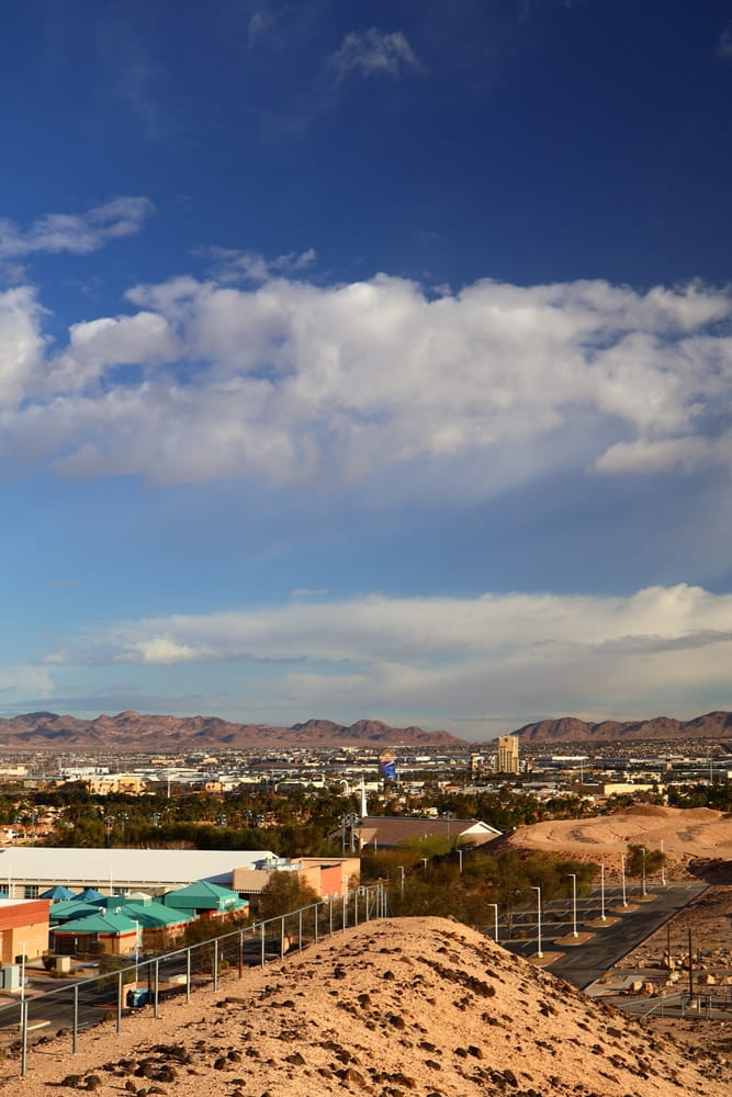 Cloudy Blue Sky and Rooftop view of Henderson NV 